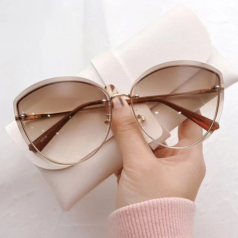 High Quality women's Oval Riml - مراجعة Sunglasses Cat Eye وسعره